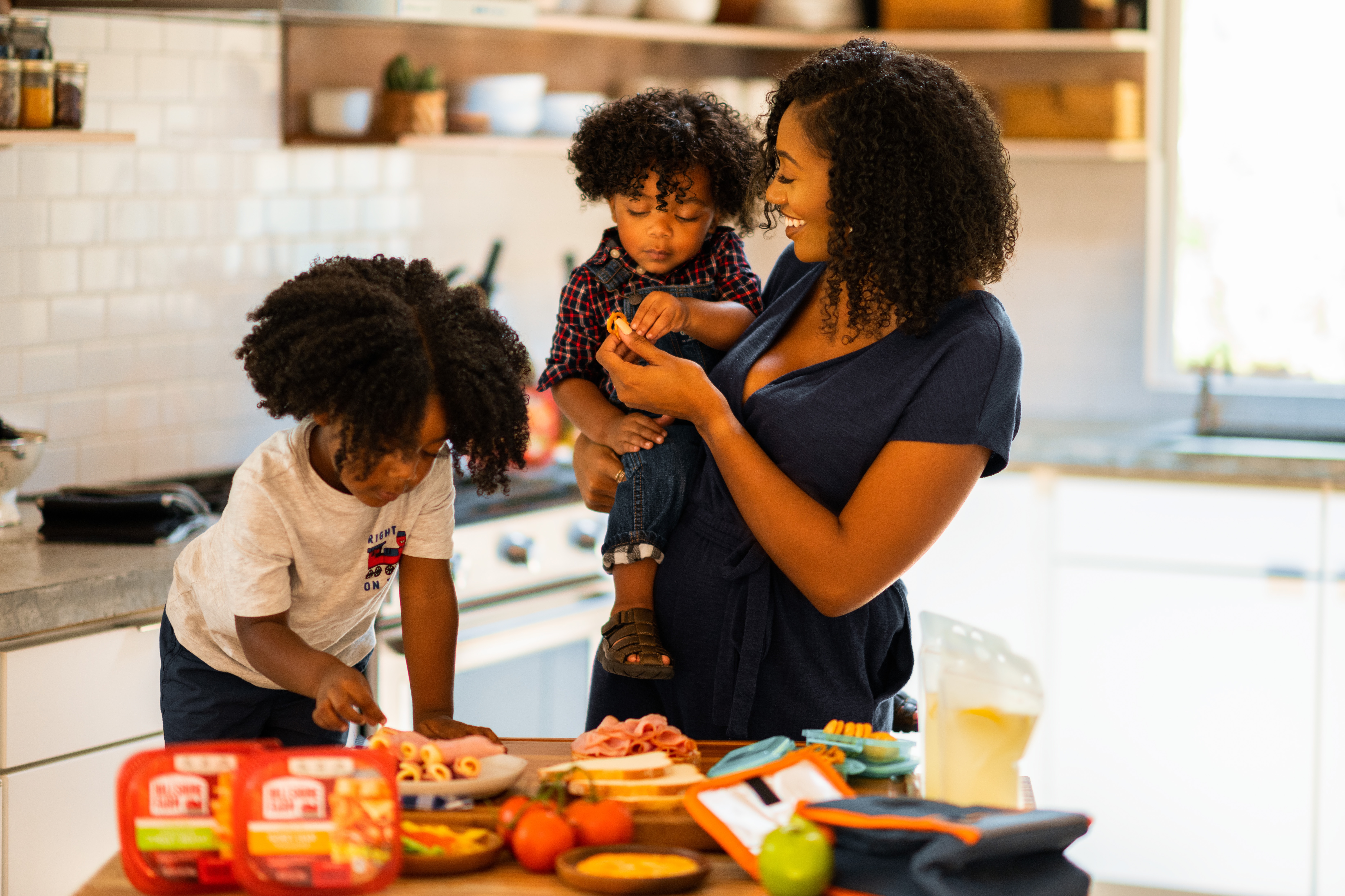 mother and children in kitchen