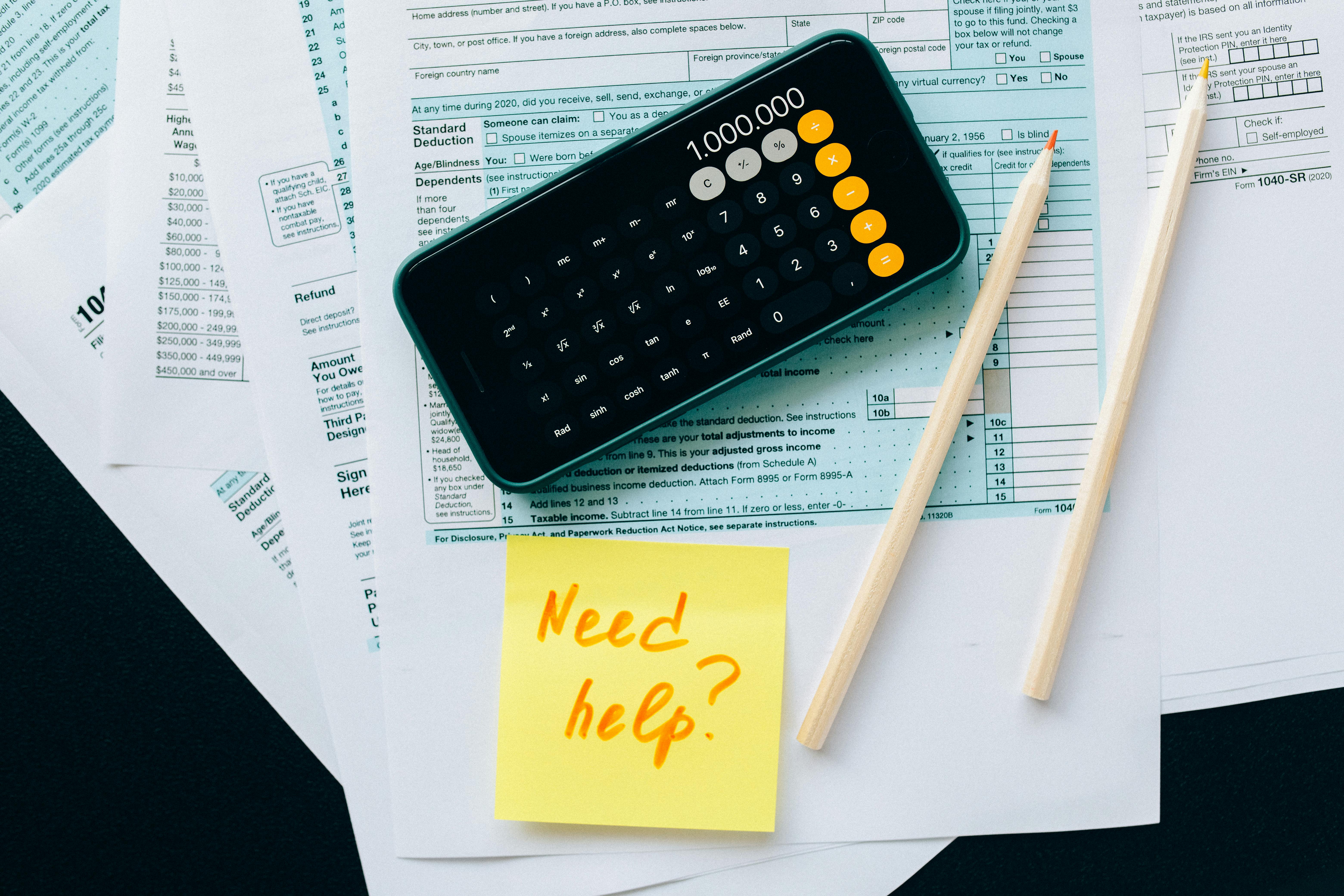 Calculator and post it that reads need help? on paperwork